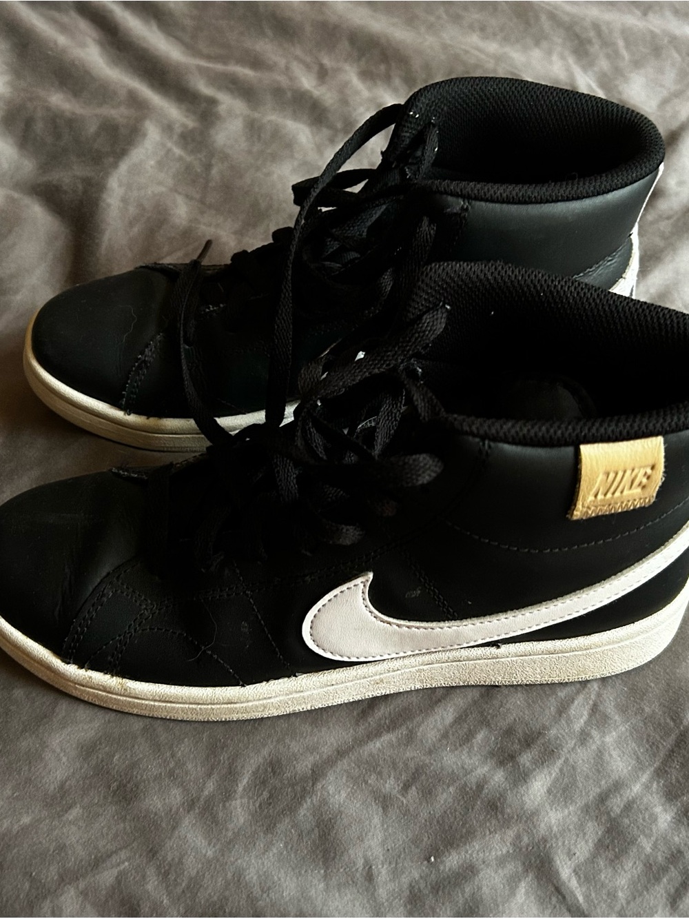 Nike Black and White Mid-Top Sneakers with Gold Heel Tab